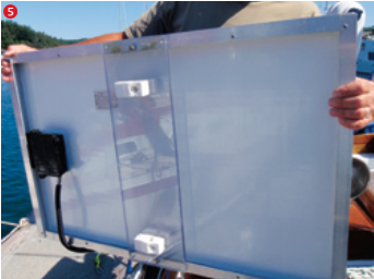 The new solar panels measured 26 x 40 inches. To mount them, I purchased two pieces of 1⁄2-inch scrap acrylic sheet cut to 7 x 26 inches. I attached one to the back of each panel using machine screws with washers and nuts.