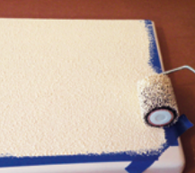 Stephen rolled the paint in all directions until the surface texture looked right.