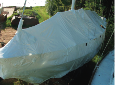For its second winter, Femme du Nord’s reused shrinkwrap cover was a bit baggier than during its first winter, but it held up as Paul had hoped.
