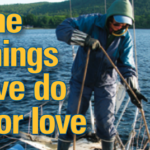 A woman pulling anchor on a muddy deck