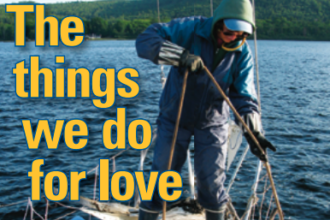 A woman pulling anchor on a muddy deck