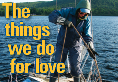 A woman pulling anchor on a muddy deck