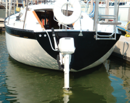 Making up for the absence of genoa tracks, slotted toerails provide multiple options for leading the jibsheets, at right. The unusual color scheme shows off the vee transom.