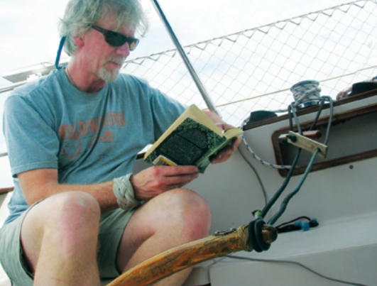Dennis sets up his Twins to steer the boat while he devotes time to other important aspects of sailing . . .