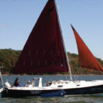 Nick and Gayle Scheuer get a lot of use out of their Shearwater 28, True North. here they are sailing on the wind with a reef in the jib and the windward leeboard raised.