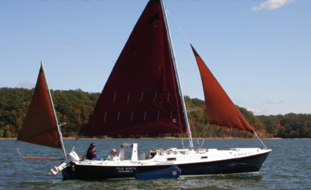 Nick and Gayle Scheuer get a lot of use out of their Shearwater 28, True North. here they are sailing on the wind with a reef in the jib and the windward leeboard raised.