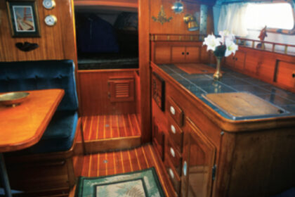 Once neglected, Sinfonietta, a modest Cal 25, now has a richly finished interior that has many details found usually in bigger, more luxurious vessels.