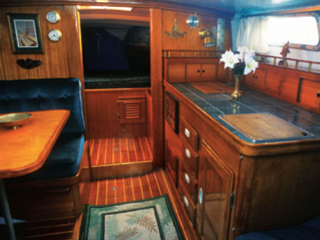 Once neglected, Sinfonietta, a modest Cal 25, now has a richly finished interior that has many details found usually in bigger, more luxurious vessels.