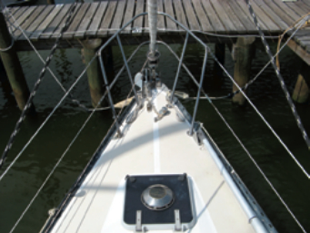 The bow has a fine entry. The ventilation hatch on the foredeck does not directly interfere with foredeck work, but the crew needs to be mindful of it, especially if the open hatch is covered by a doused sail.