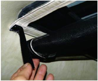 A Velcro tab holds the rolled-up screen at the ready but out of the way until it’s needed to keep out invading insects.