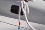 With one end made fast on the boat and the other tucked into a ring on the lifeline, Michael’s dockline is set up so a helper on the dock can easily grab it and take it to a dock cleat.