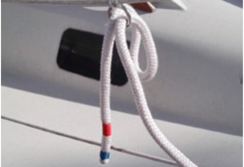 With one end made fast on the boat and the other tucked into a ring on the lifeline, Michael’s dockline is set up so a helper on the dock can easily grab it and take it to a dock cleat.