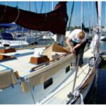 Susan Landry prepping the deck for retreading