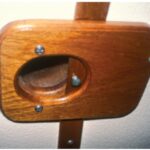 Don controls the air entering through his Dorades with sliding closures made of plywood and varnished to match the cabin trim.