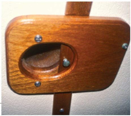 Don controls the air entering through his Dorades with sliding closures made of plywood and varnished to match the cabin trim.