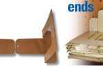 Stan dissuades his sandpaper from becoming unruly by sandwiching it between bookends.