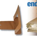 Stan dissuades his sandpaper from becoming unruly by sandwiching it between bookends.