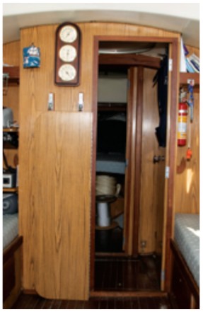 With the table stowed, access forward to the head and stateroom is much improved.