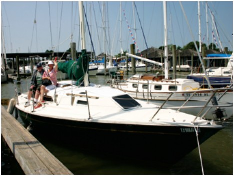 Johnny and Elizabeth Nimmons are happy about their just-purchased 1982 US 30, a $1,000 investment. They’d come to the marina that Saturday to go sailing. Unsuspecting, and out of curiosity, they stopped to watch the auction and wound up buying five boats.