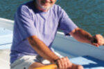 A man in a rowboat