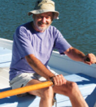 A man in a rowboat