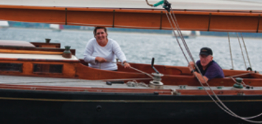 Elegant in black, Yumi, a Knight yawl, sailed in the woodie fleet under the guidance of Bruce Nelligan and crew.