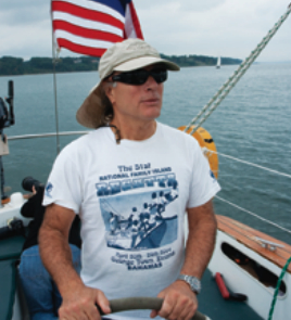 Capt. Steve Sanders pilots Gary’s good old 1969 Pearson 35 centerboarder, Viridian while Gary photographs the fleet.