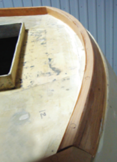 The “booty rail” caps the transom.