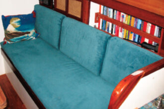 New cushions make a big splash in any good old boat, and Sirena’s are no exception. They look plump and inviting because Mary cut the foam a little larger than the cushion covers.