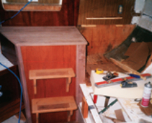 Dave fitted a small chart desk into the space on the port side next to the new engine box.