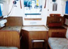 The aft galley was common in boats of the 1970s (and so was the woodgrain laminate).
