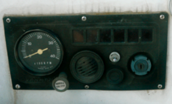 The 26-year-old engine control panel was intact, although dirty, weather-beaten, naked, and exposed.