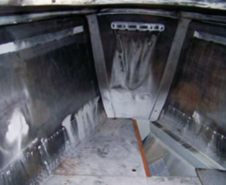 The once-white vinyl hull liner in the V-berth cabin was beyond cleaning and had to be replaced.