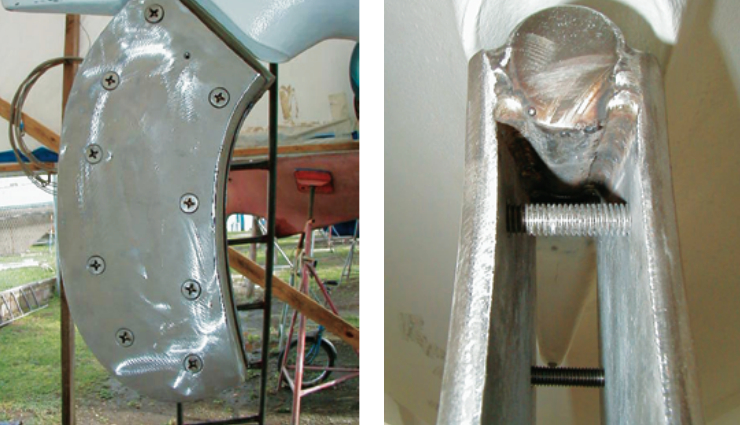 The cheek plates, at left, will be bolted to the rudder blade. They will transfer the rudder load to the rudder stock, at right, to which they are connected by substantial welds.