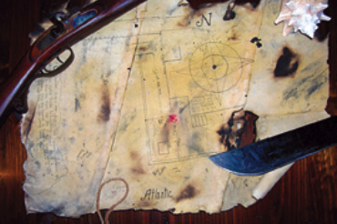 A tattered remnant of canvas bears the secret to where an intrepid father-and-son crew buried a hoard of treasured belongings.