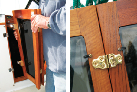 Gary fits the bi-fold doors onto the pintles that serve as hinges, at left. This view from the inside shows the brass hinges and the turn buttons that hold the inserts in place, at right.