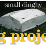 A thorough coating of algae and grime attests to the sedentary life this dinghy had led.