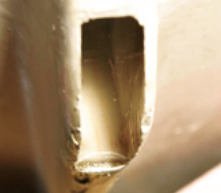 Because epoxy doesn’t stick to it, the packing tape covering the foam blank left a nice finish on the inside of the wheel well.
