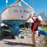 Picture of a man with a boat