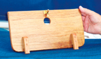 Ken made his cubby covers from plywood. They lock in place with wooden tabs and an elbow catch.