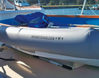 Inflated, the Dinghy Dogs resemble pillows on either side of the boat.