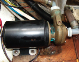 Caribee’s water-maker uses the engine to drive the high-pressure pump. The 12-volt Dc boost pump, below, ensures that a steady supply of raw water flows through the system.