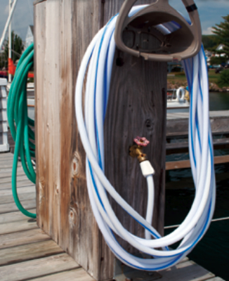 This service pedestal has white and green hoses attached. The color does make a difference. The white hose is intended for potable water.