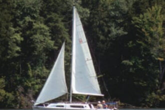 Lazy Daze, a 1976 American 23, owned by Dan Merkle, enjoys a light and lazy summer day.