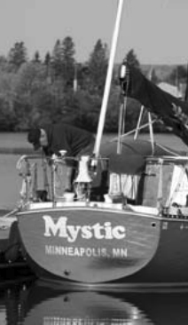 Jerry Powlas checks the docklines. The editors refer to the telltale smudge on their C&C 30 as “diesel butt.”
