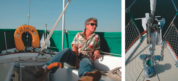 Holly Scott, above, owned and singlehanded Catspaw for 23 years. Mainsail sheeting is from the end of the boom to a traveler behind the helm. The box aft of the tiller houses a propane tank. Fitted out for serious cruising, Catspaw has both an autopilot and windvane, stern anchor, and weathercloths. Carrying a plow and second lightweight anchor, above right, enables one to choose the anchor better suited to a particular seabed. A manual Simpson Lawrence windlass is able to retrieve both anchors.