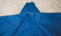 Detail of the “pucker” in the edge of the canvas. A similar one is on the other side.
