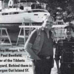 Charley Morgan, left, with Paul Benfield, owner of the Tibbets Boatyard. Behind them is a Morgan Out Island 51.