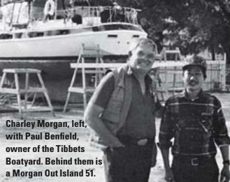 Charley Morgan, left, with Paul Benfield, owner of the Tibbets Boatyard. Behind them is a Morgan Out Island 51.