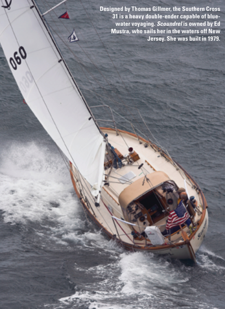Designed by Thomas Gillmer, the Southern Cross 31 is a heavy double-ender capable of bluewater voyaging. Scoundrel is owned by Ed Mustra, who sails her in the waters off New Jersey. She was built in 1979.